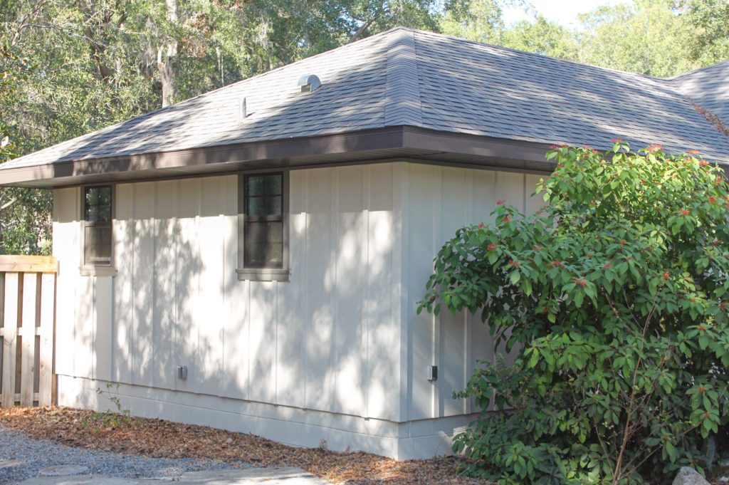 Side exterior renovation featuring Hardie siding replacement.