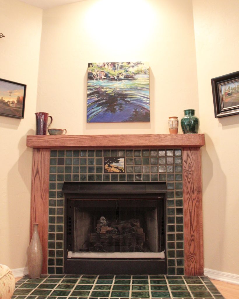 Living room remodel with upgraded fireplace and mantel.
