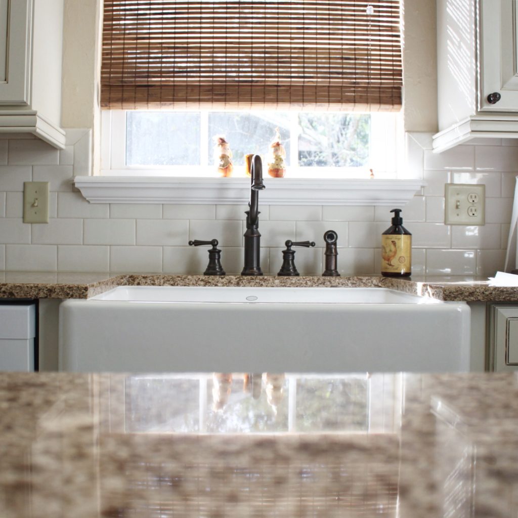 Kitchen sink and countertop installation with modern finishes.