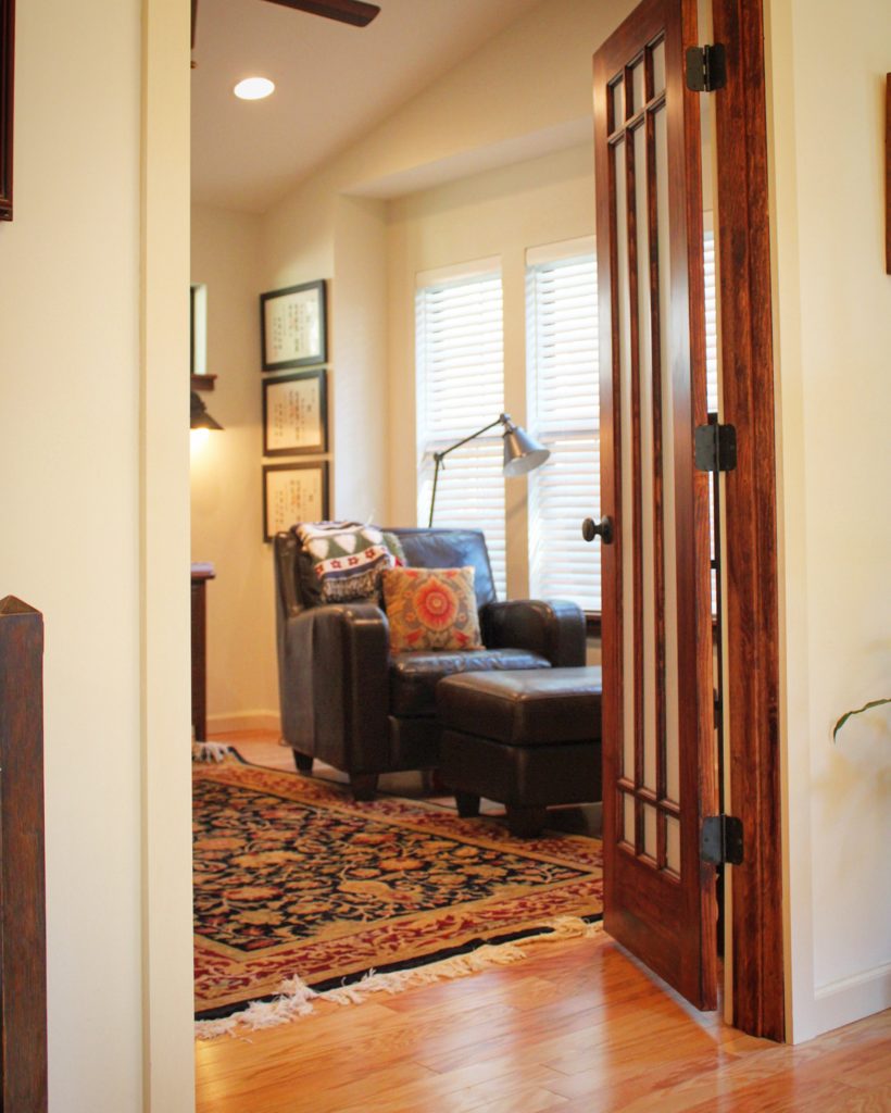 Interior remodel featuring new doorway and updated finishes.