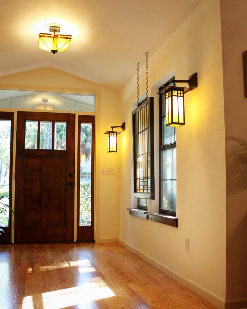 Home entry remodel with upgraded finishes and front door.