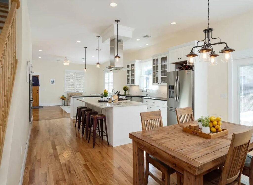 Open kitchen and dining area renovation in newly constructed home.