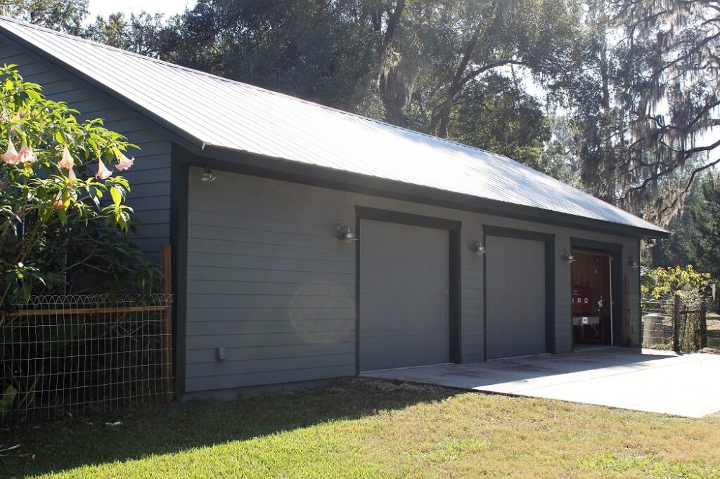 Garage exterior repainting and trim restoration project.