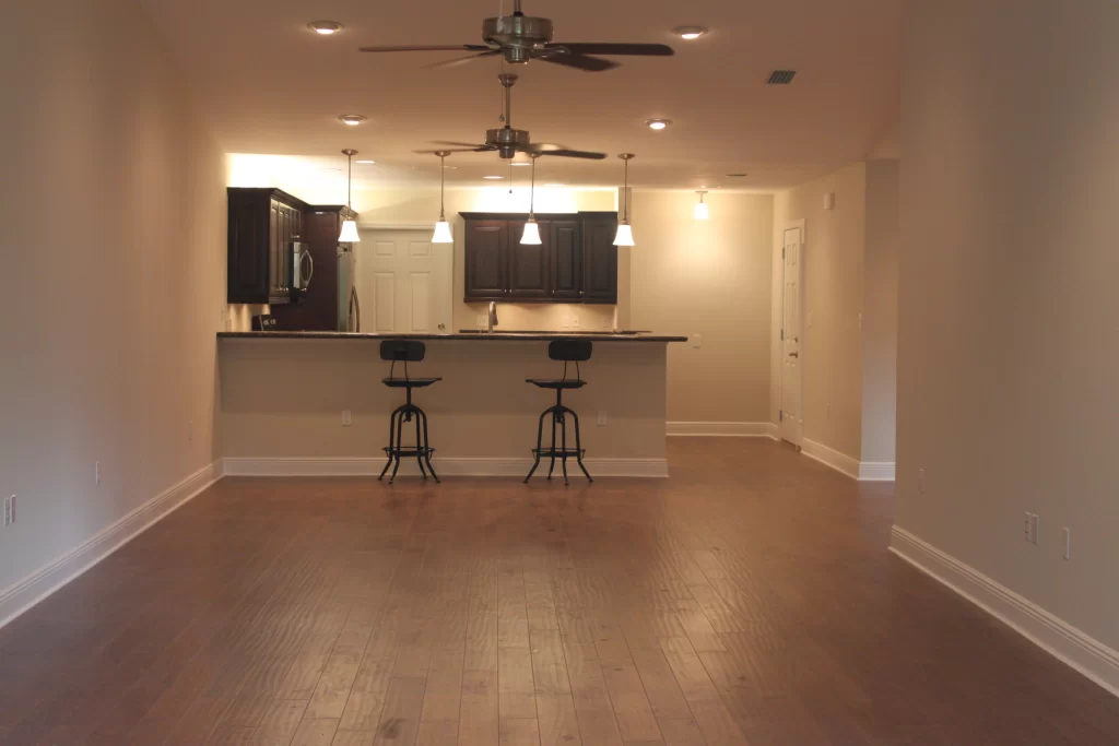 Open-concept kitchen renovation viewed from living area.