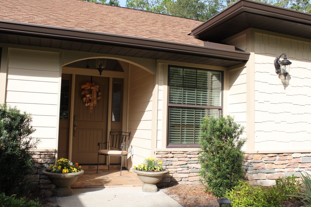 Renovated residential entryway with upgraded exterior finishes.