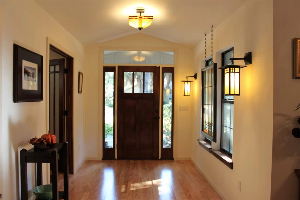Entryway renovation with upgraded lighting and interior finishes.