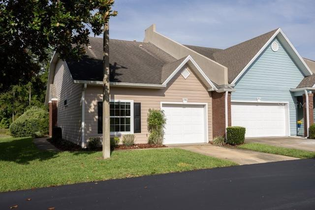 HOA Hardie siding and trim repair with multi-color repaint.